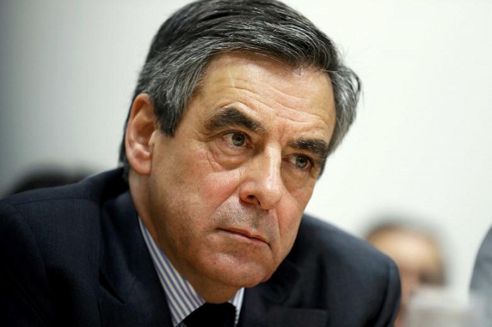 France`s Fillon under renewed fire ahead of Sarkozy talks 